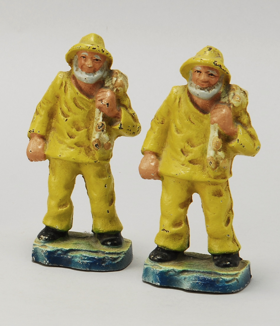 Appraisal: PAIR OF PAINTED CAST IRON BOOKENDS th CenturyIn the form