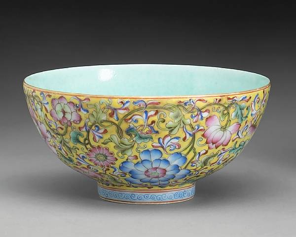 Appraisal: A yellow ground famille rose enameled porcelain bowl Guangxu Mark