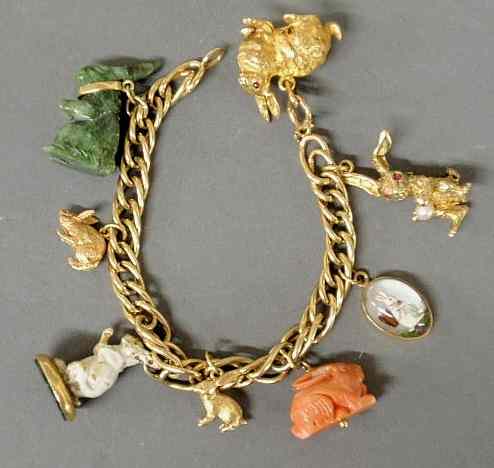 Appraisal: Charm bracelet k yg bracelet with eight gold rabbit charms