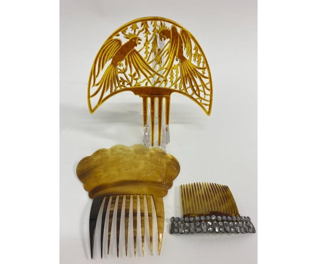 Appraisal: Three Victorian celluloid hair combs to include a cut and