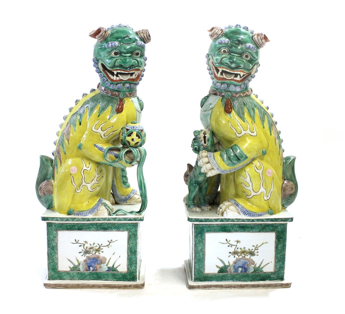 Appraisal: A pair of Chinese famille-verte Buddhist lions th century each