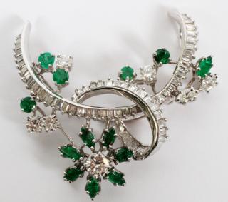 Appraisal: PLATINUM DIAMOND AND EMERALD LADY'S BROOCH PLATINUM DIAMOND AND EMERALD