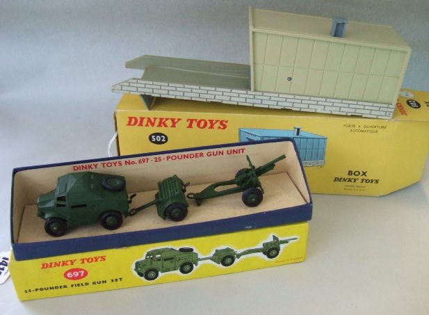 Appraisal: A Fench Dinky Garage and a Dinky -Pounder field gun