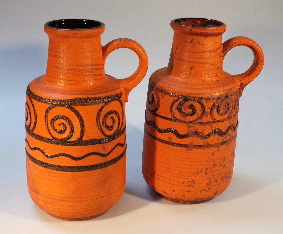 Appraisal: A pair of 's West German earthenware ewers each circular