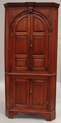 Appraisal: Pine one piece raised panel arched two door over two