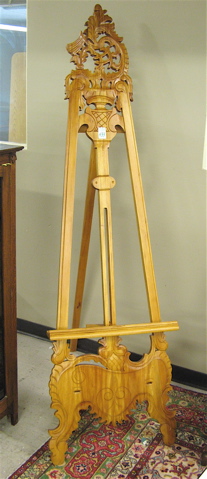 Appraisal: CARVED MAHOGANY TRIPOD ART EASEL large floor model having a