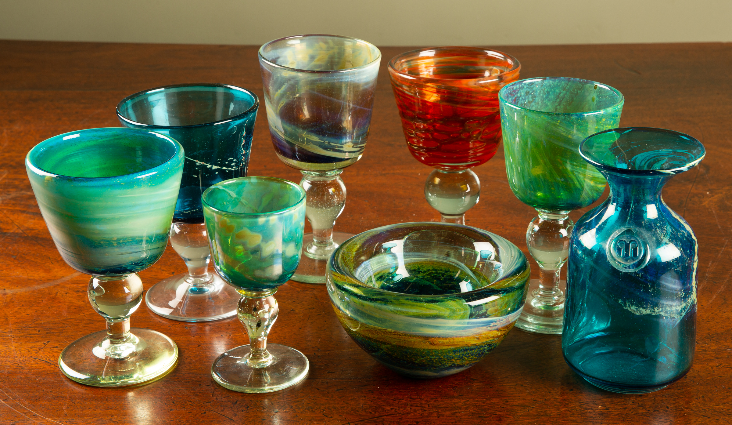 Appraisal: A collection of Mdina Malta glassware to include trailed orange