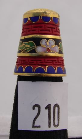 Appraisal: Cloisonne and cinnabar style thimble