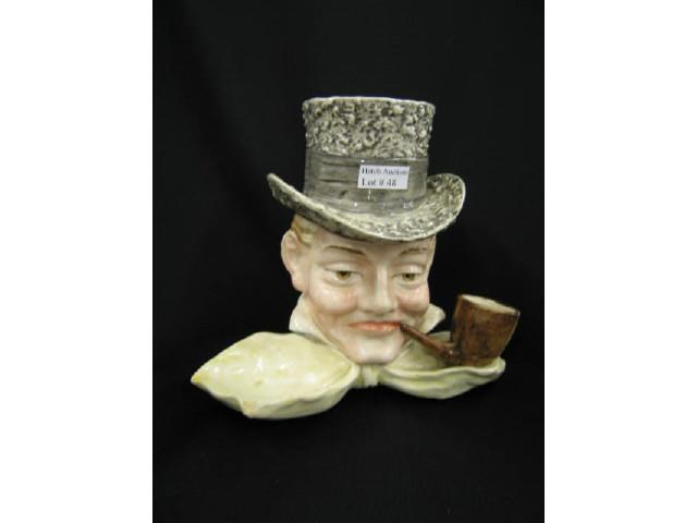 Appraisal: Victorian Figural Majolica Pottery Tobacco Jar man with bow tie