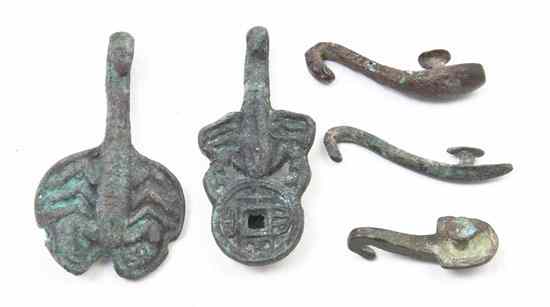 Appraisal: A Set of Five Chinese Patinated Bronze Belt Hooks two