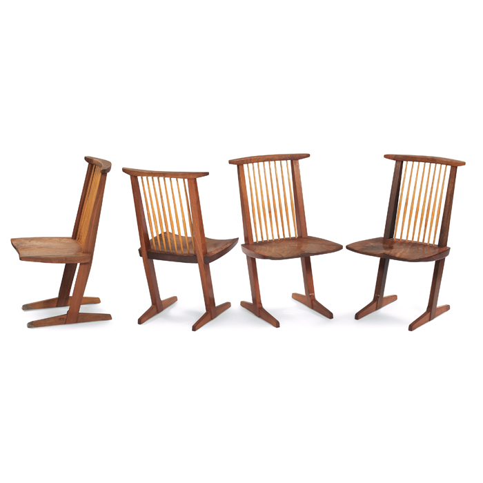 Appraisal: George Nakashima Conoid chairs four walnut solid slab seats hickory