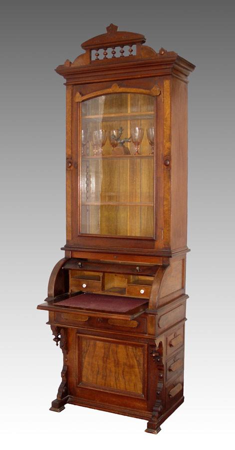 Appraisal: A RARE EASTLAKE VICTORIAN CYLINDER ROLL SECRETARY DESK Walnut embellished