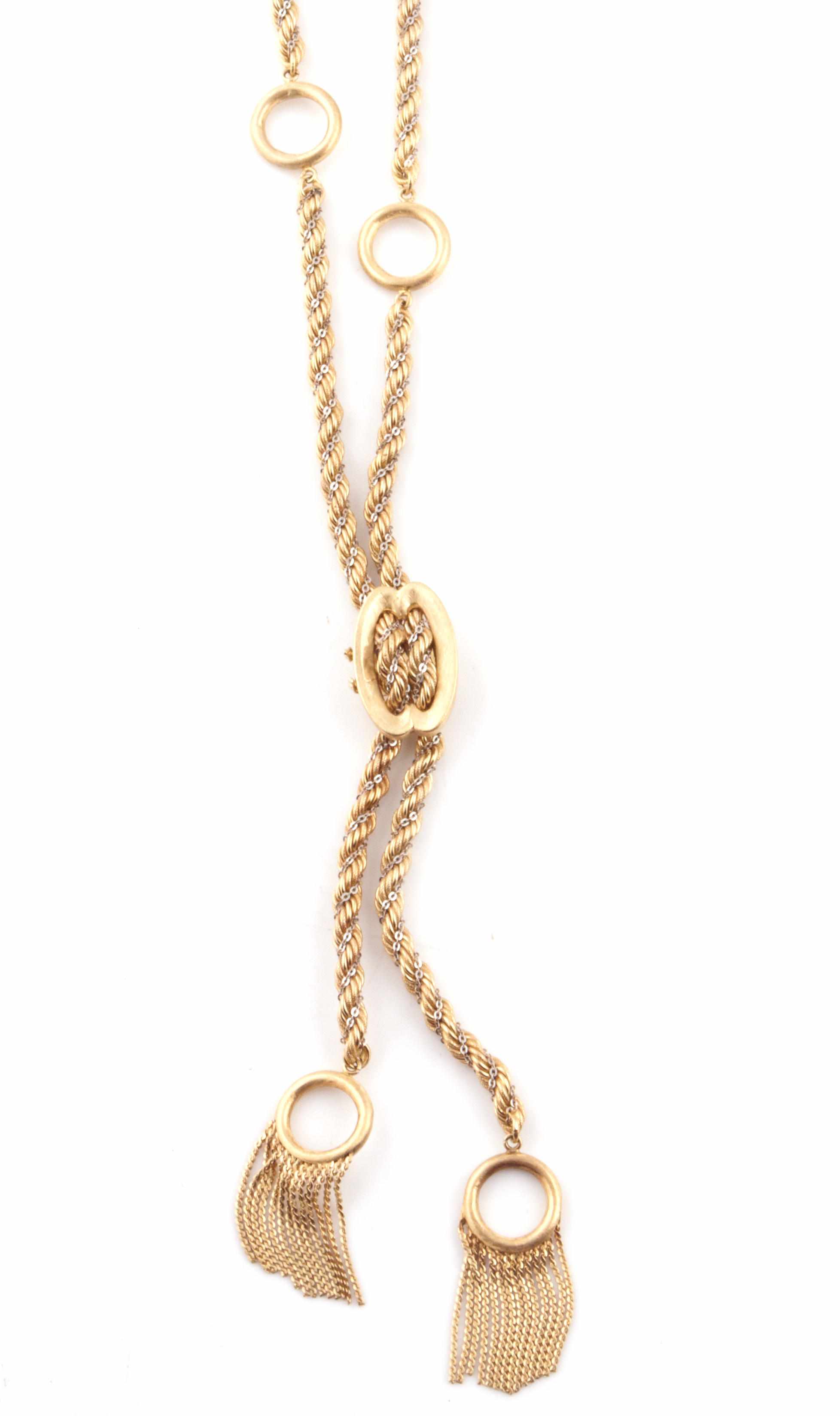 Appraisal: A bicolor gold rope chain lariat necklace length approximately in