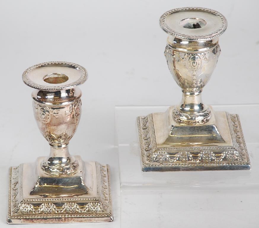 Appraisal: PAIR OF LATE VICTORIAN WEIGHTED SILVER DWARF CANDLESTICKS Sheffield