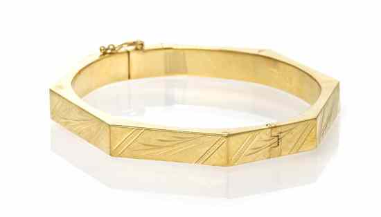 Appraisal: A Karat Yellow Gold Octagonal Bangle Bracelet with engraved foliate