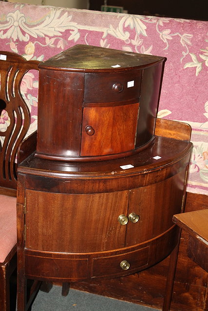 Appraisal: A MAHOGANY CORNER WASH STAND and a small corner cupboard