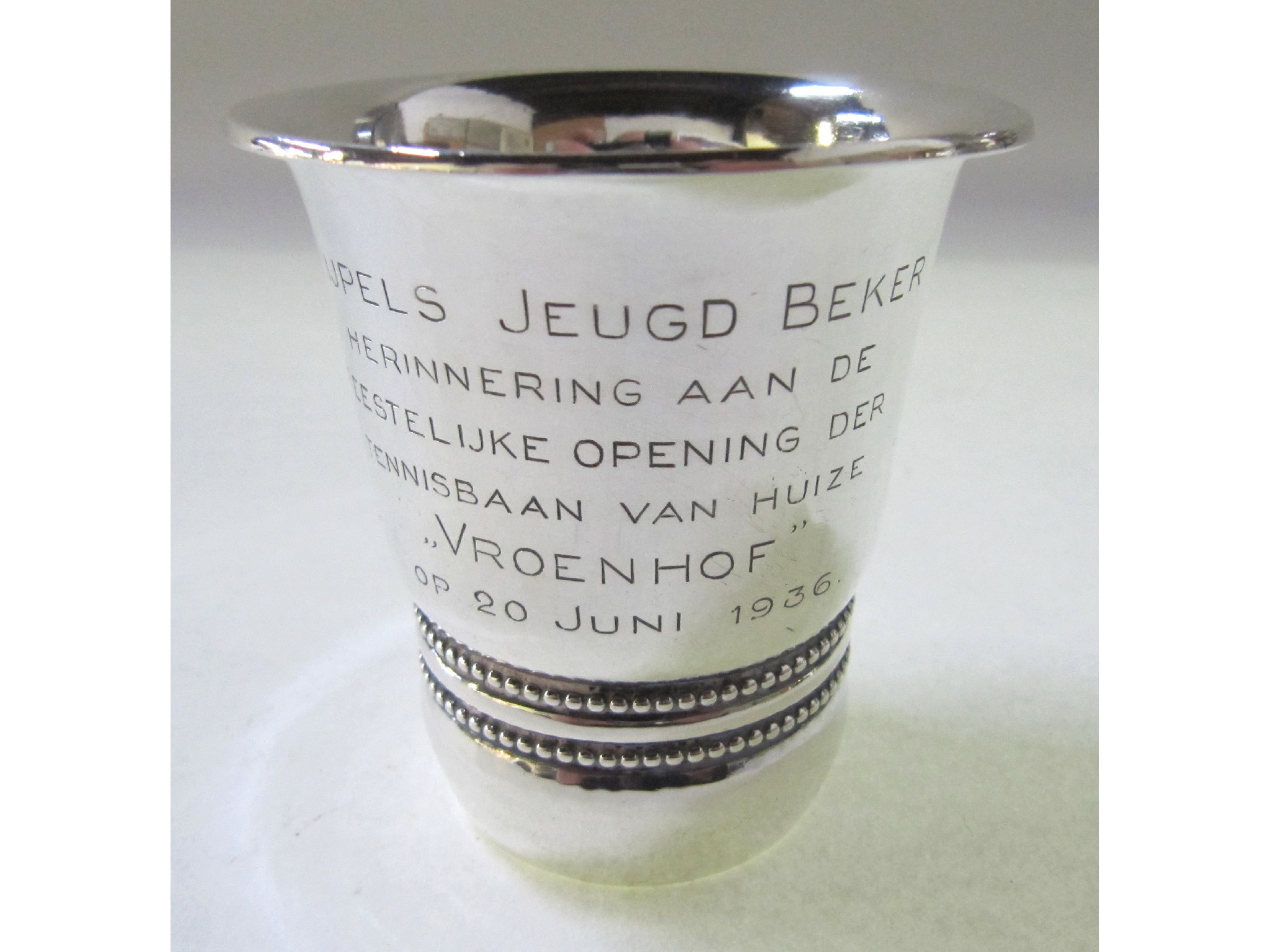 Appraisal: A sterling silver presentation tot cup by Georg Jensen