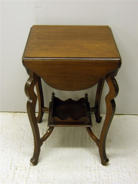 Appraisal: th century mahogany table with four shaped drop leaves on