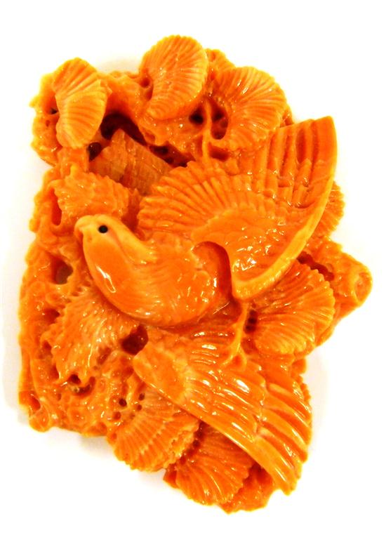 Appraisal: JEWELRY Coral Bird in a Tree Carved Coral measures approximately