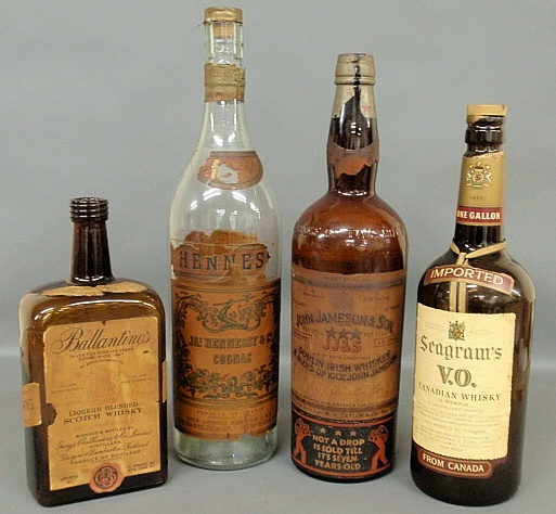 Appraisal: - Four very large liquor bottles- Seagram s VO Ballantines