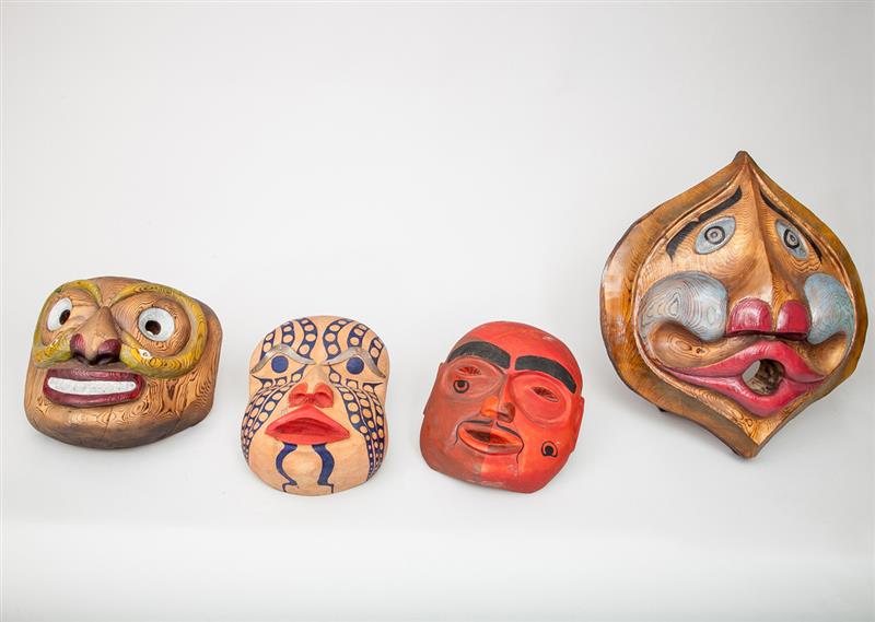 Appraisal: Four Northwest Coast Carved and Painted Wood Face Masks Each