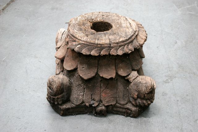 Appraisal: A carved wooden capital base adapted into a stand