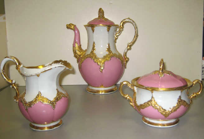 Appraisal: MEISSEN PINK GROUNDED PORCELAIN COFFEE SET Three piece comprising a