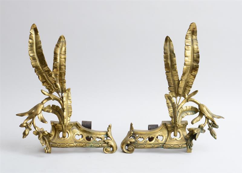 Appraisal: PAIR OF CONTINENTAL ROCOCO STYLE GILT-METAL CHENETS Each pierced front