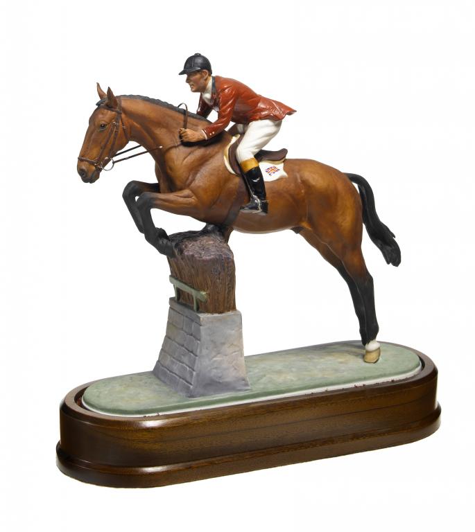 Appraisal: A ROYAL WORCESTER EQUESTRIAN STATUETTE OF FOX HUNTER AND LT