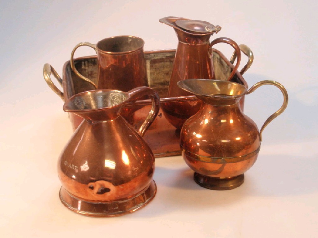 Appraisal: A Victorian copper rectangular planter three jugs and tankard