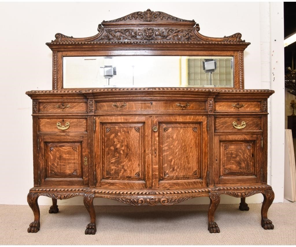 Appraisal: Large oak sideboard circa with beveled glass mirror serpentine front