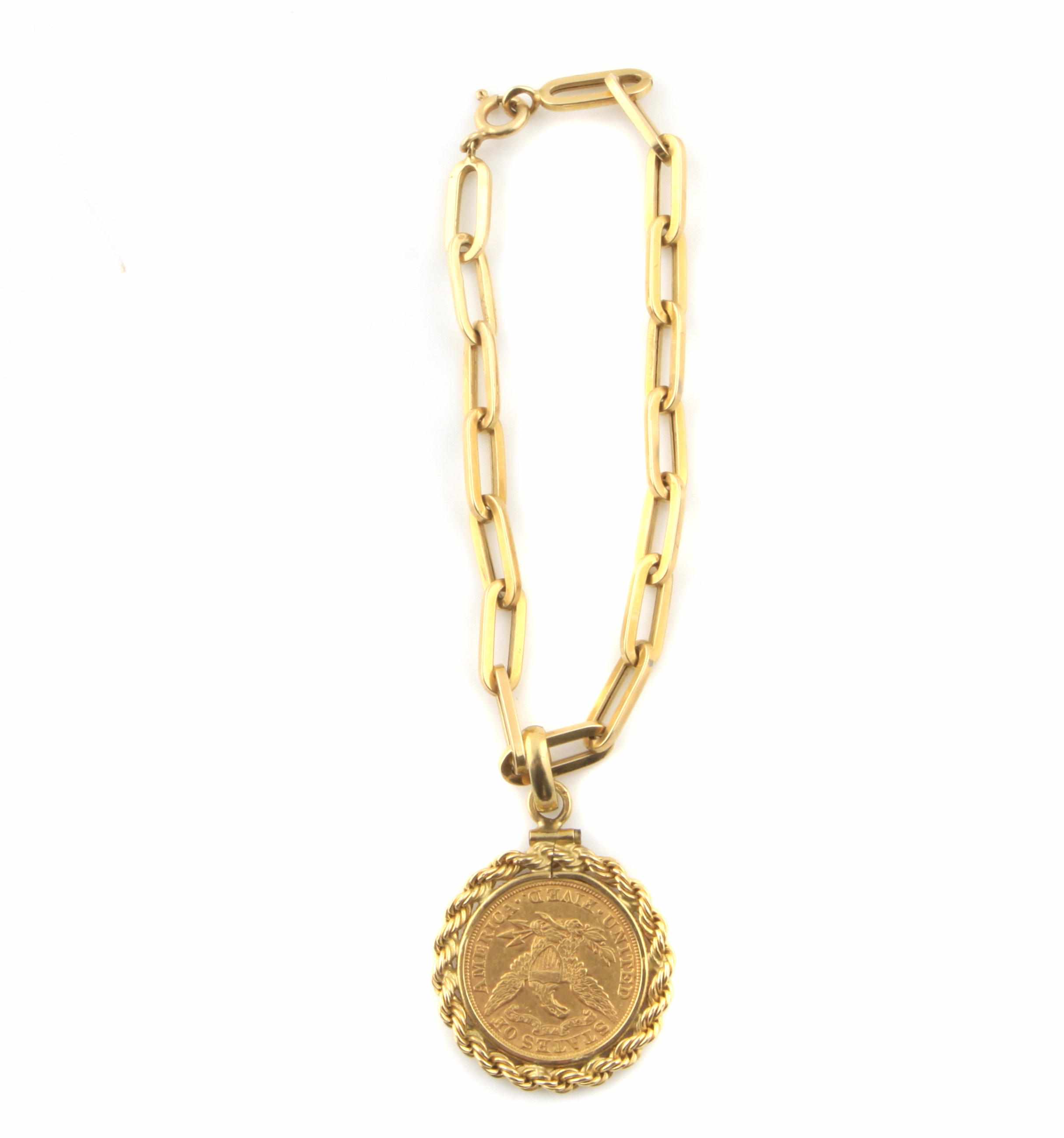 Appraisal: A dollar gold coin and k gold bracelet g gross