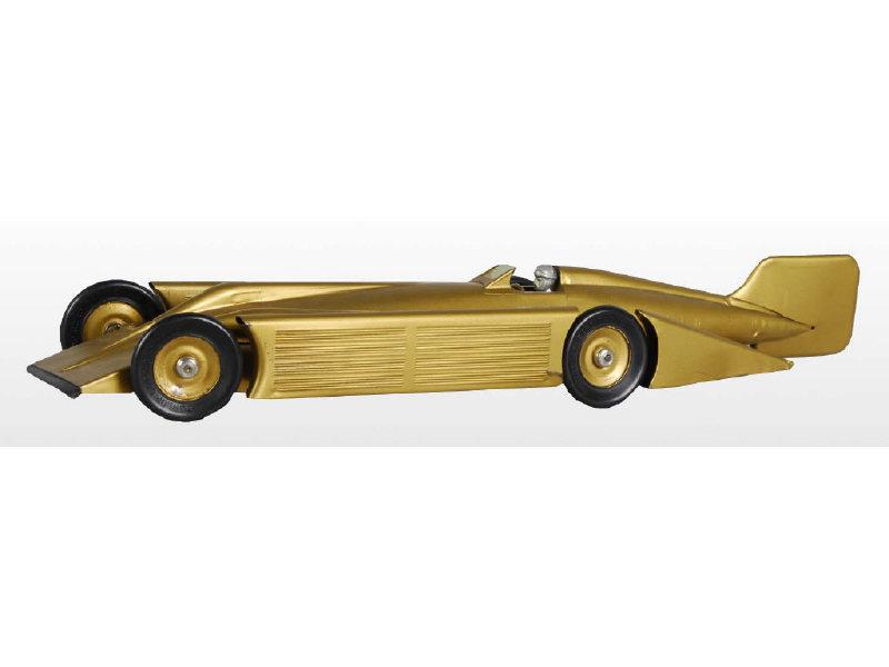 Appraisal: Pressed Steel Kingsbury Golden Arrow Racer Description Wind-up Working Includes