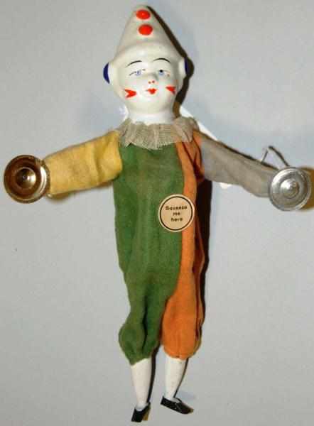 Appraisal: Clown Toy with Cymbals Composition head Press chest and clown