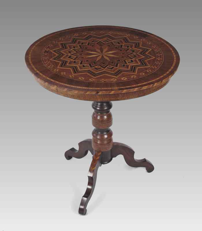 Appraisal: TH C PARQUETRY INLAY TEA TABLE Intricate starburst design on