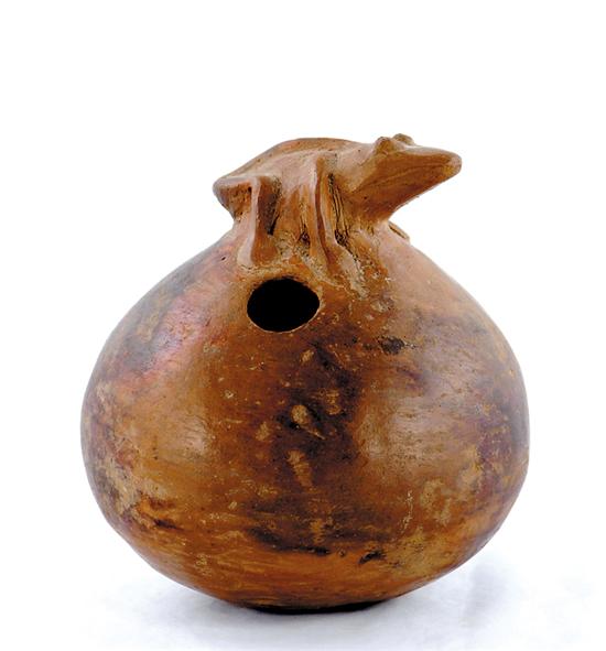 Appraisal: Pre-Colombian clay vessel frog seated atop sphere with side spout