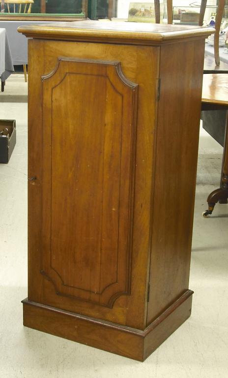 Appraisal: Victorian mahogany music cabinet the rectangular panelled door enclosing four