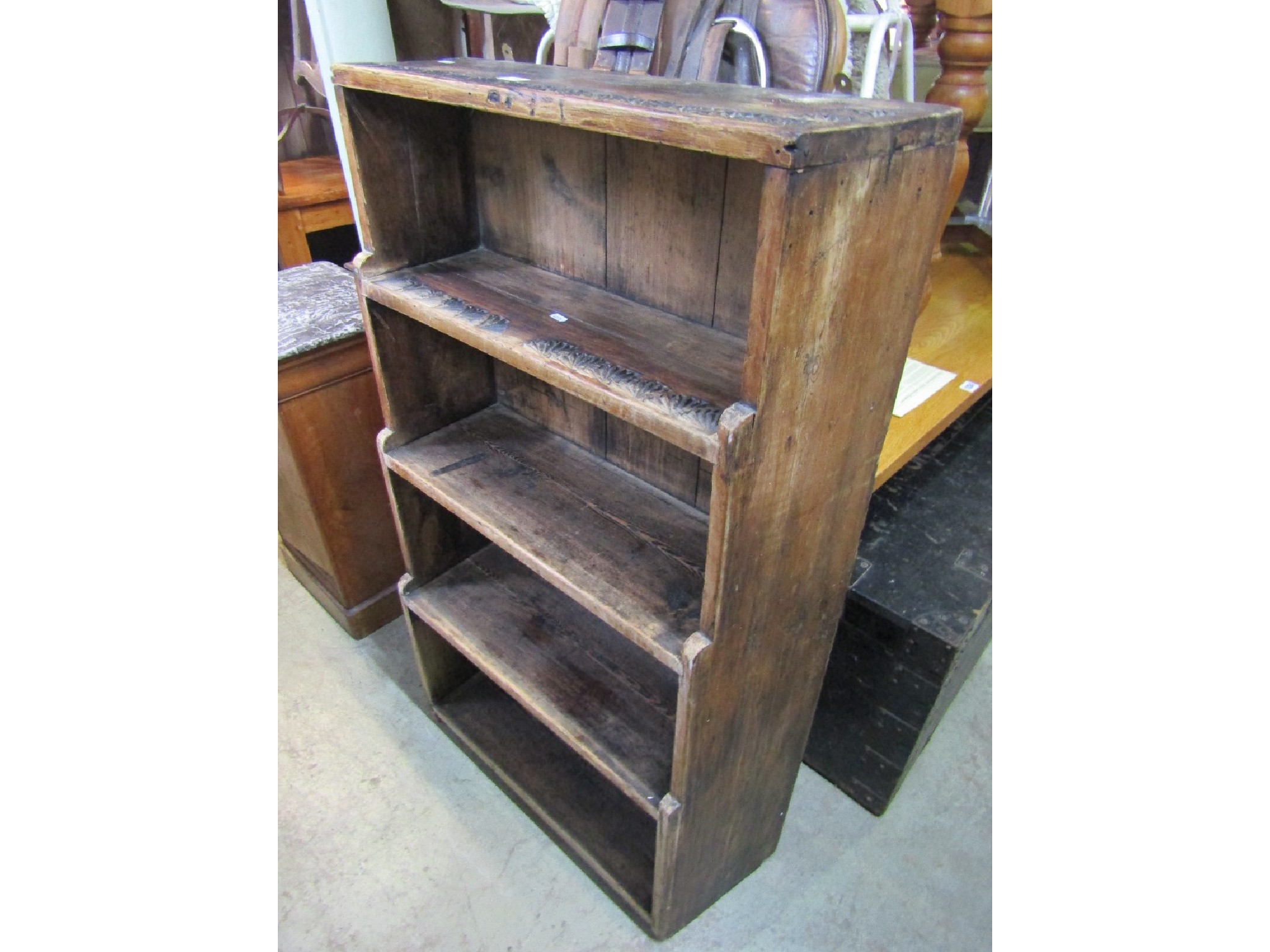 Appraisal: A rustic freestanding pine open bookcase with fixed graduated shelves