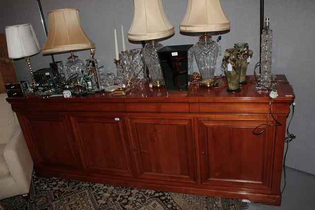 Appraisal: A CONTINENTAL MAPLE WOOD SIDE CABINET with four moulded frieze