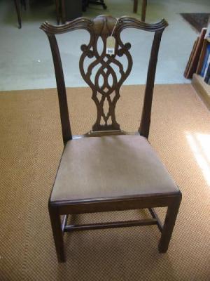 Appraisal: A SET OF EIGHT MAHOGANY DINING CHAIRS of Chippendale type