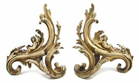 Appraisal: A Pair of Rococo Style Gilt Bronze Chenets of scrolling