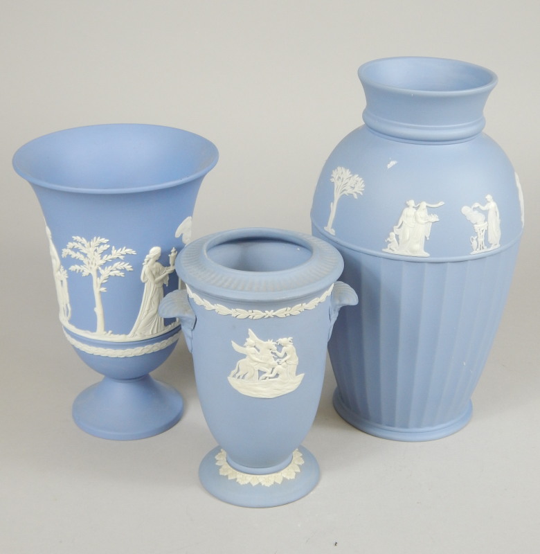 Appraisal: Three Wedgwood blue Jasperware vases each of different form the