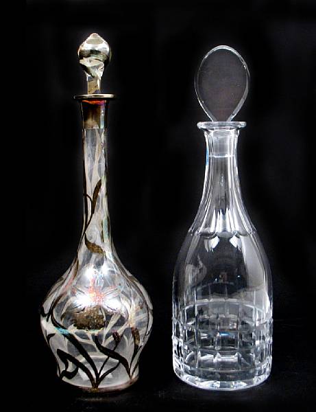 Appraisal: An Orrefors decanter together with a silver overlay glass decanter