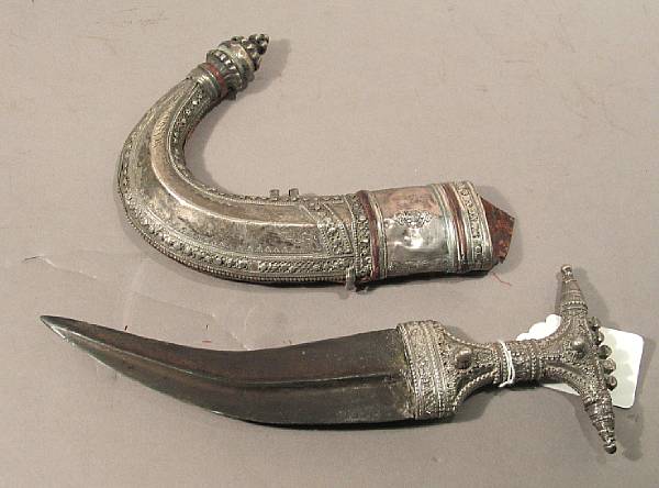 Appraisal: A silver-mounted Arabian jambiyasouthwestern Arabia late th early th century