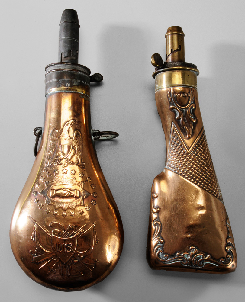 Appraisal: Two Powder Flasks one gunstock flask - in dents and