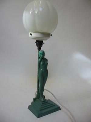 Appraisal: AN ART DECO FIGURAL TABLE LAMP as a naked young