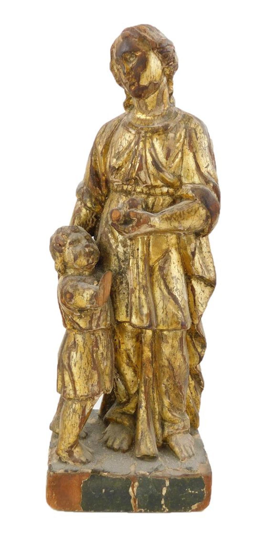 Appraisal: Carved giltwood figure of a mother and child Continental th