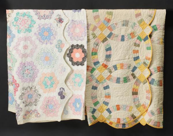 Appraisal: TWO VINTAGE FEEDSACK QUILTSThe two quilts in feedsack fabrics 'Grandmother's