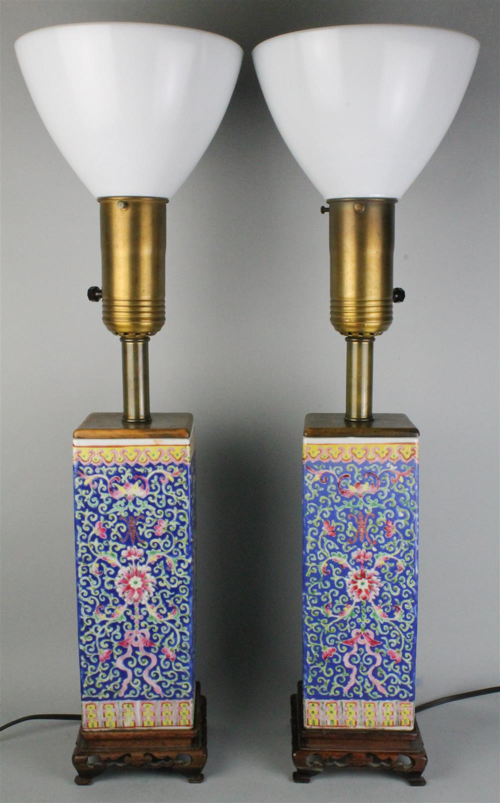 Appraisal: PAIR OF CHINESE FAMILLE ROSE BLUE GROUND HAT STANDS of