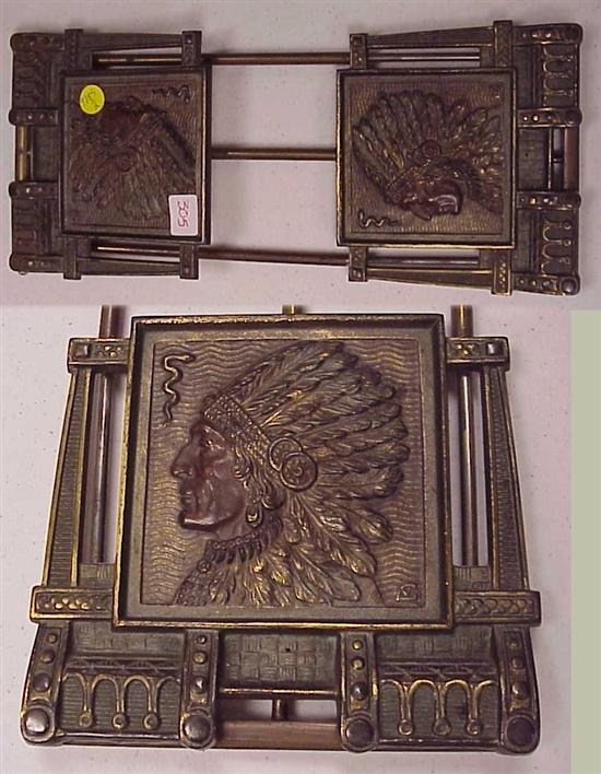 Appraisal: Book rack two folding ends with cast metal relief of